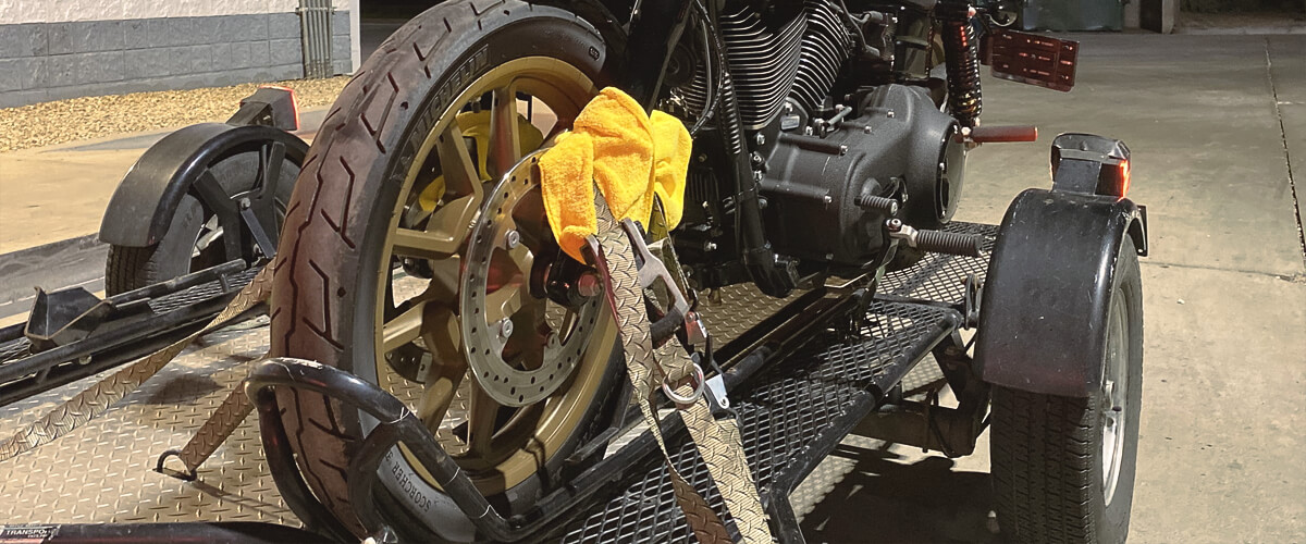 essential equipment and tools for strapping down a motorcycle