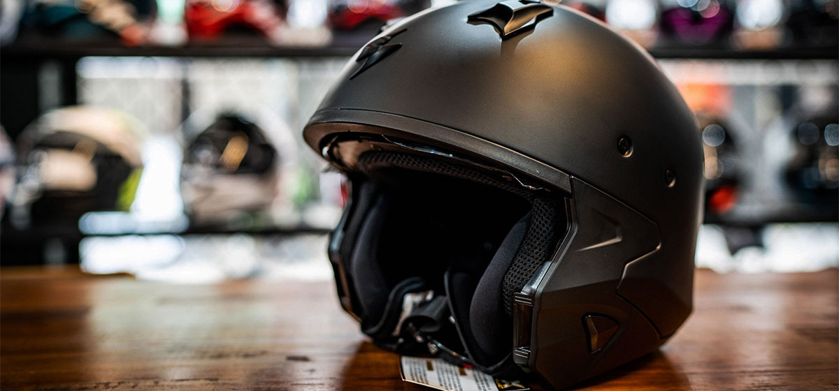 why do motorcyclists choose half helmets?